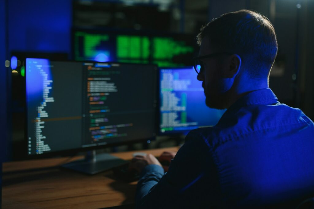 programmer working at desk in office